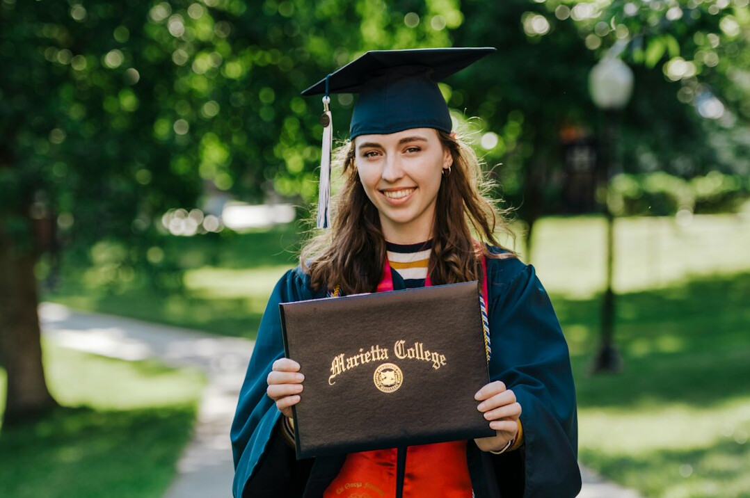 graduation cap and laptop