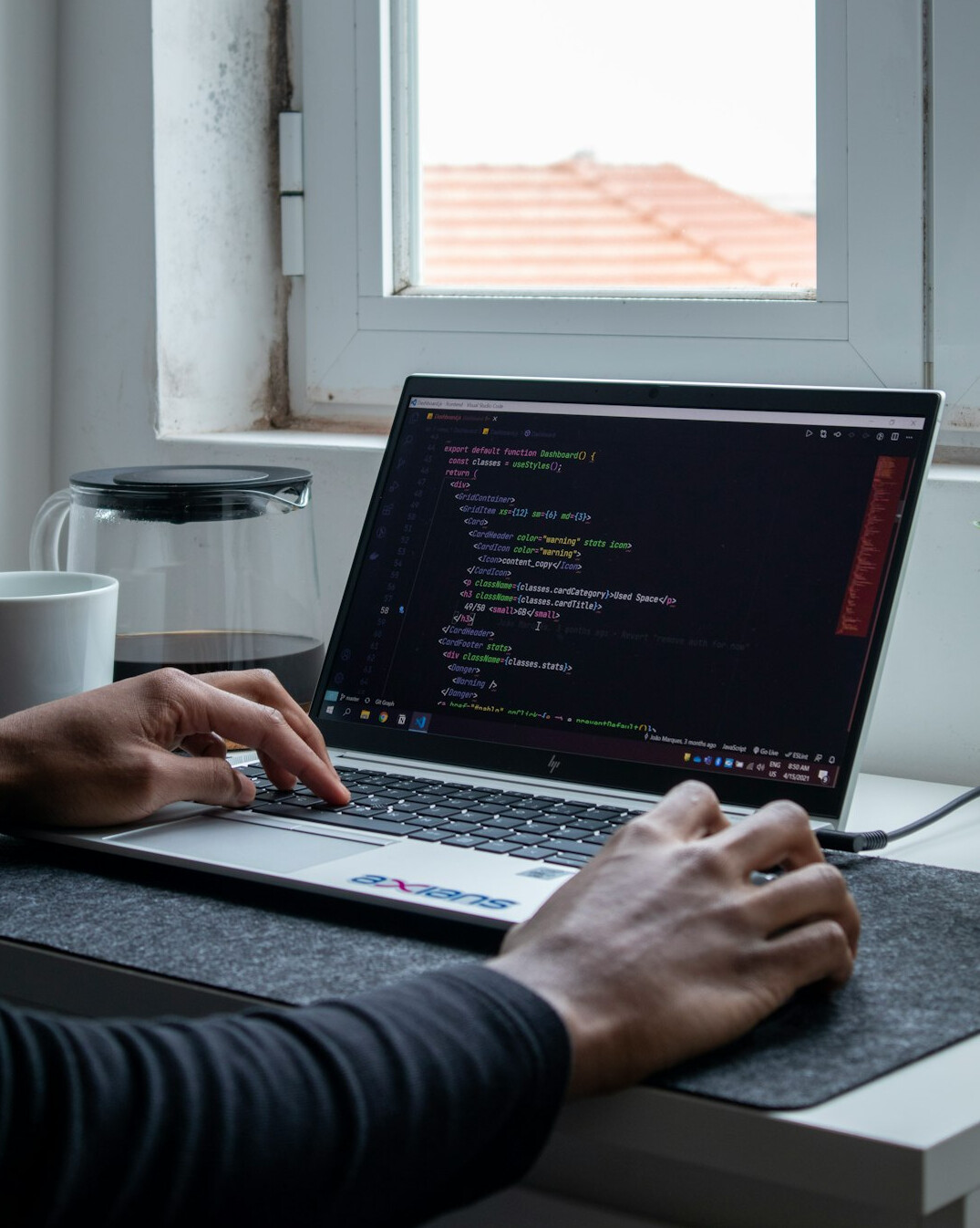 woman coding at home